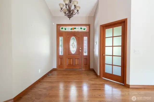 Entry foyer with oak hardwood floors