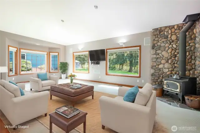 Spacious living area with wood burning fireplace