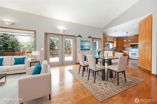 Dining area with oak hardwood floors.