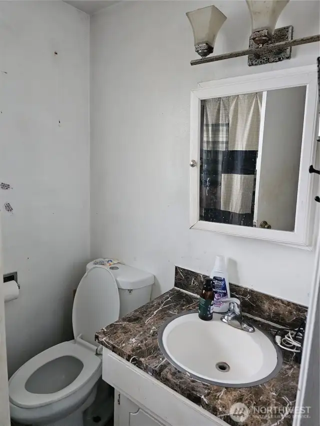 Units One and Two are both 1 level with the same floorplan. Bathroom with tub/shower.