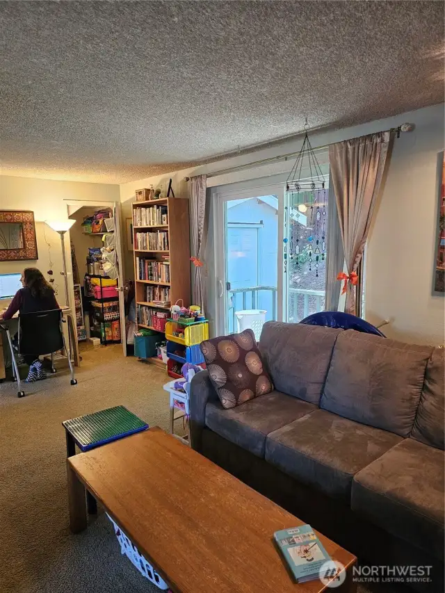 Units three and four are both 2 levels with the same floorplan. Living room.