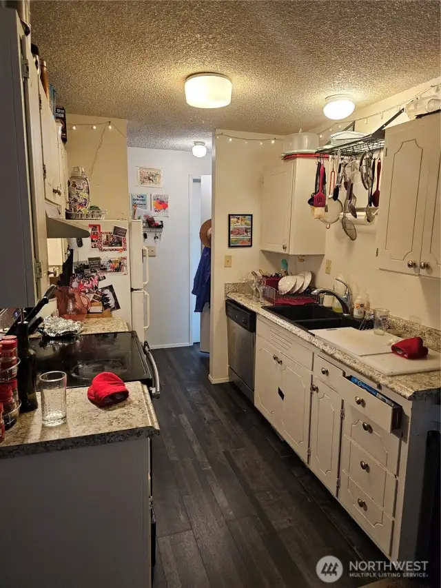 Units three and four are both 2 levels with the same floorplan. Kitchen