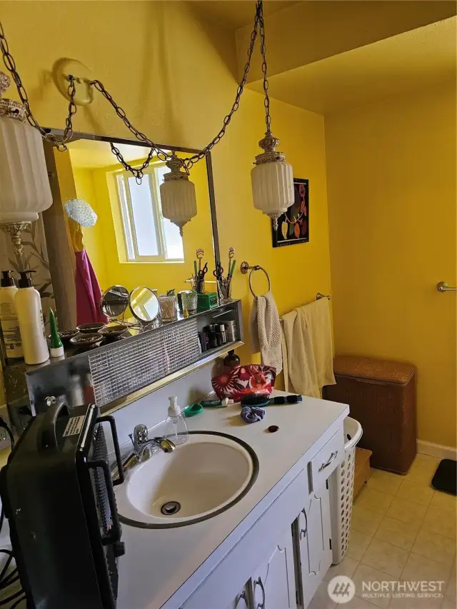 Units three and four are both 2 levels with the same floorplan. Bathroom
