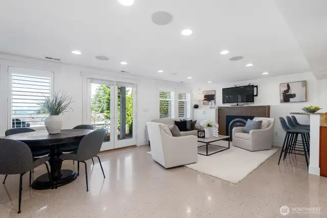 Walk-out basement has epoxy floor, looks like terrazzo