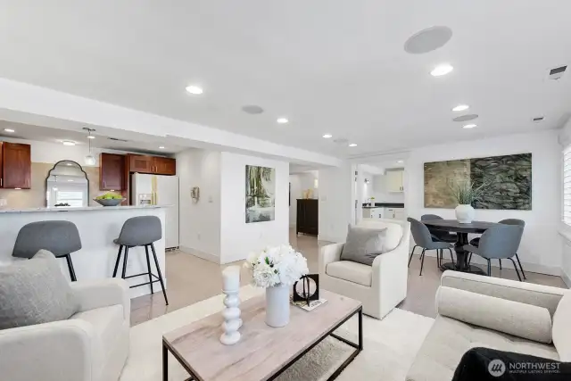 Built in surround sound and with double doors out to the deck and backyard