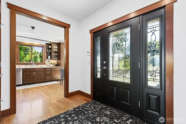 Entering, to the right is the kitchen. To the left is the powder room.