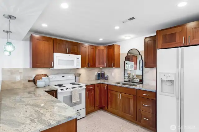Full kitchen with wine fridge in the basement