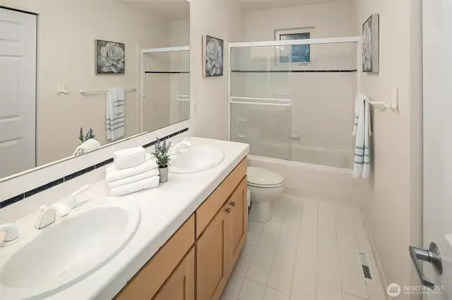 Full bath upstairs with dual vanities