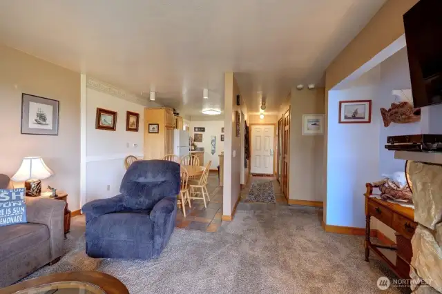 View from Living room looking to kitchen and entry