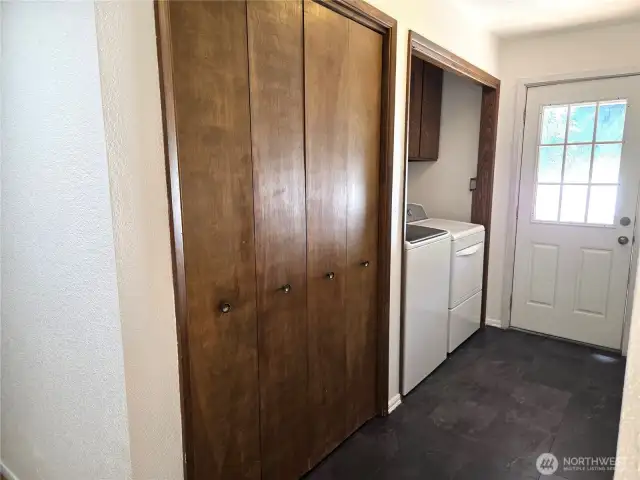 Laundry and deck entrance, located between guest bath and kitchen