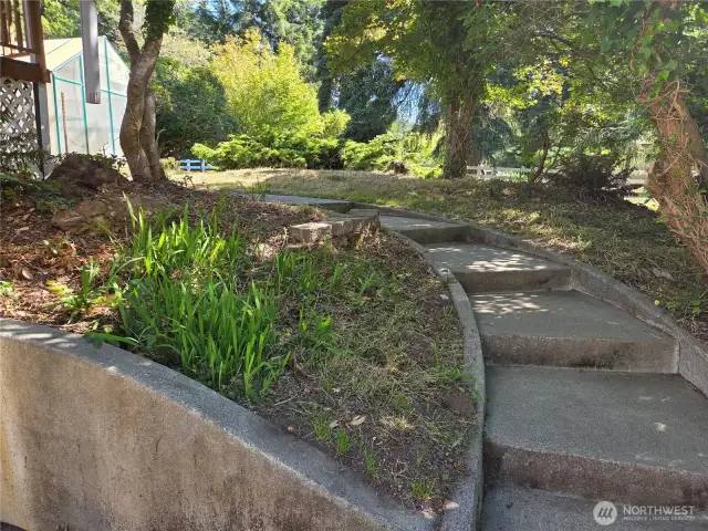 Steps from back go to back deck and green house