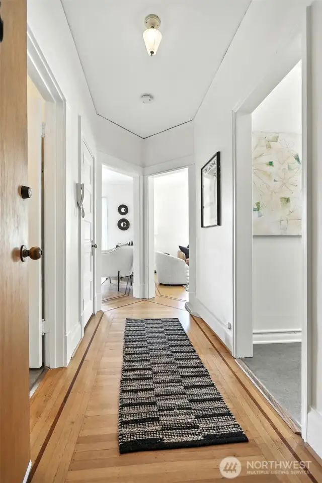 Enjoy original hardwood floors and inlays throughout the home.