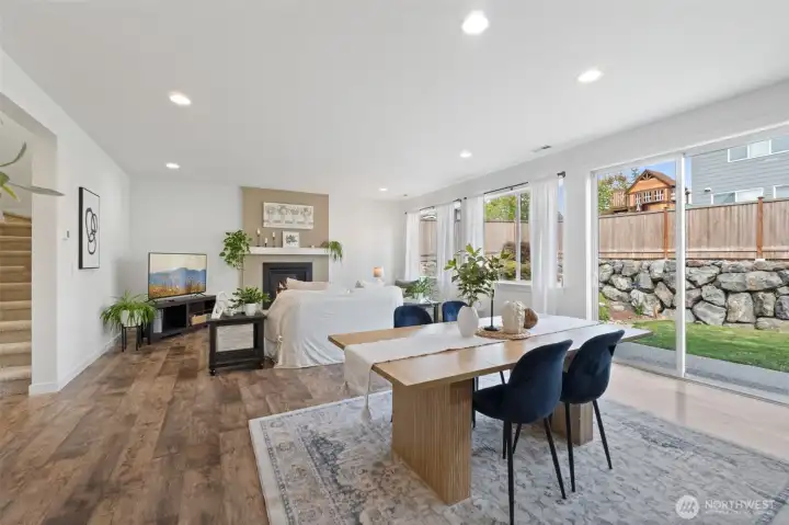 Great Room with Gas Fireplace and Large Slider to Backyard