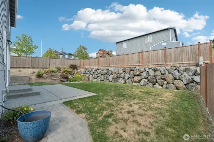 Peaceful Waterfall in the corner of the Fully Fenced Backyard