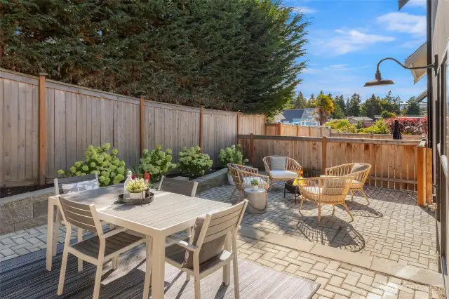 Fully fenced yard with peak views of the Sound—ideal for entertaining, gardening, or play