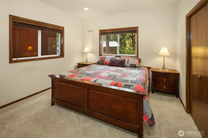 Primary bedroom on main floor with en-suite shared full bath