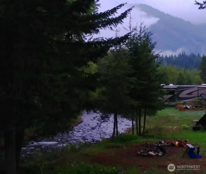 This is a photo (seller supplied) of Silver Creek (seasonal creek) that runs in front of the home