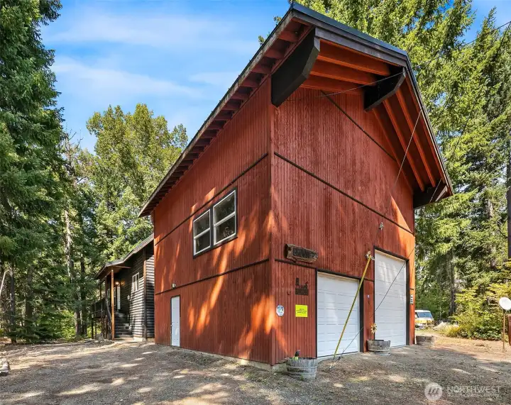 28x28 detached garage has everything you need for storage, has a 1000 pound engine hoist, RV door, 3/4 bathroom and an insulated and heated room above! What more could you ask for!!!