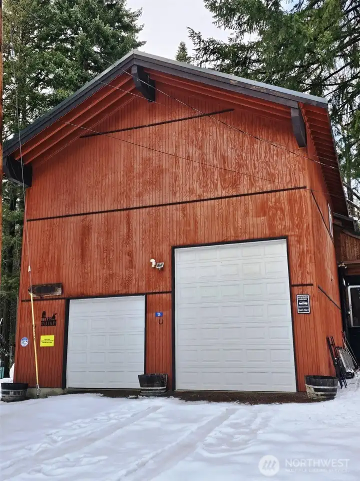 28x28 detached garage has everything you need for storage, has a 1000 pound engine hoist, RV door, 3/4 bathroom and an insulated and heated room above! What more could you ask for!!!