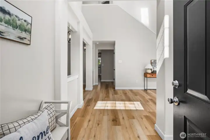 Entrance with grand vaulted ceilings