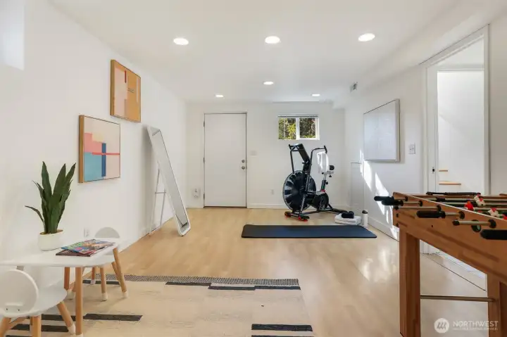 4th bedroom staged as gym and playroom.