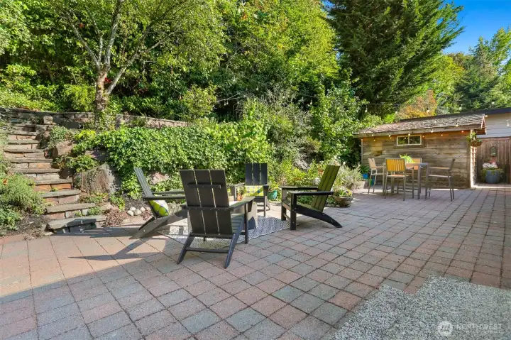 Gorgeous, private backyard with mature plantings.