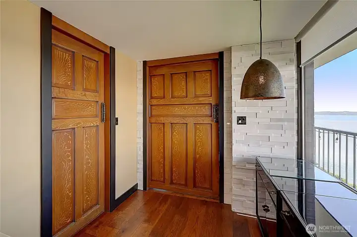Beautiful reclaimed pub doors lead to pantry and 3rd bedroom