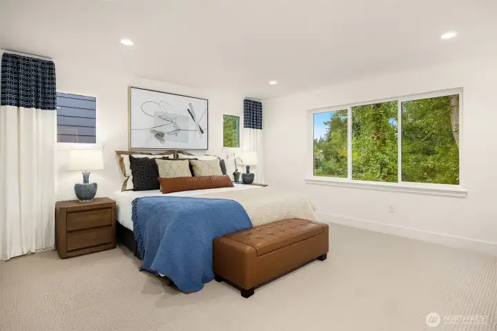 Primary bedroom with beautiful views   Photos are for illustrative purposes only