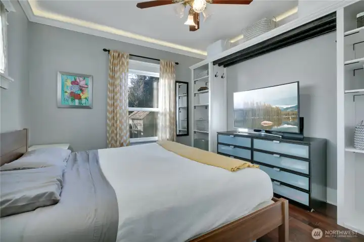 Large primary bedroom with cool built-in closet