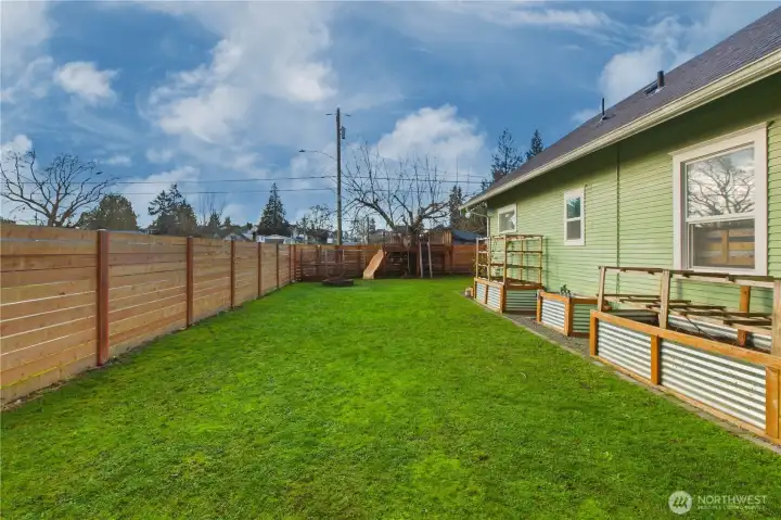 Notice the raised bed gardens with spinkler system!