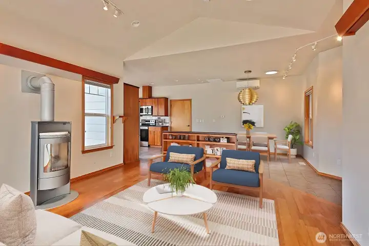 The built in bookcase divides the dining from the living area and adds nice storage for a smaller home.