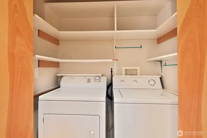 Laundry on the hall.  There is also an additional storage closet to tuck away coats and such.