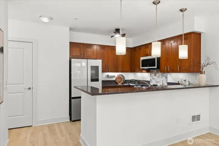 Bistro Bar can accommodate bar stools for casual dining . .