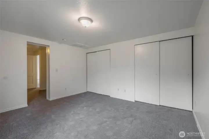 Unstaged- the primary has 2 sets of double doors, plenty of room for storage.