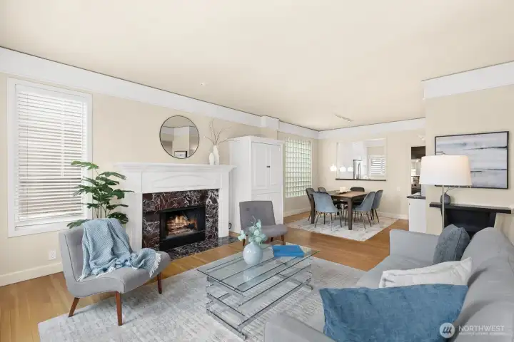 Living room north to dining room and even farther to the light-filled chef's kitchen.