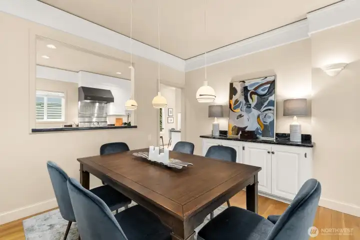 Flow effortlessly from the bright living area into the dining room, where elegant built-incabinets, a charming buffet, and a convenient pass-thru to thekitchen make hosting and everyday meals a delight.