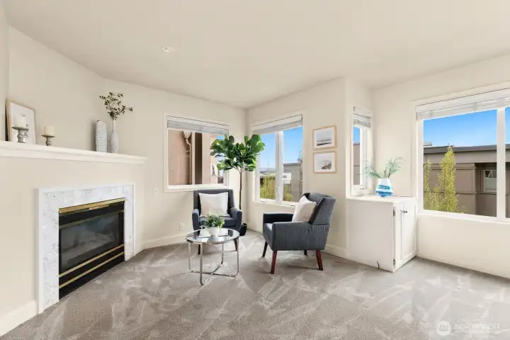 Versatile Primary space is perfect for a quiet read or a puzzle at fireside.