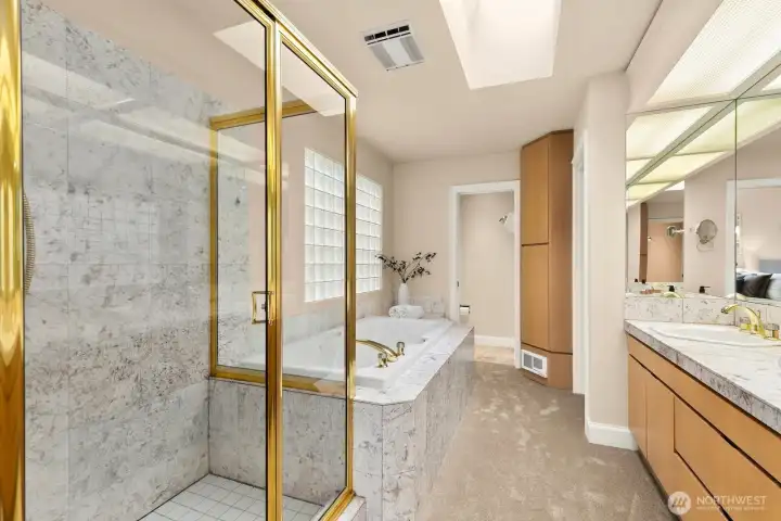 5-piece bath in primary suite with walk-in closet.