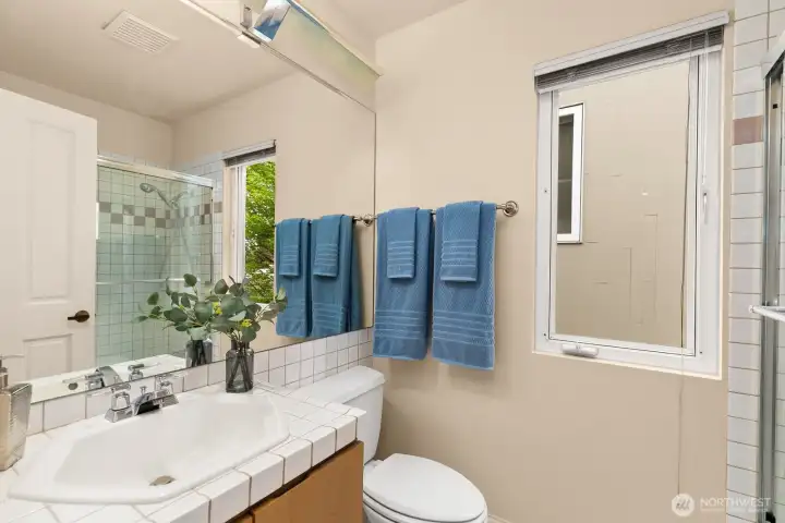 Three quarter en-suite bath in second bedroom.