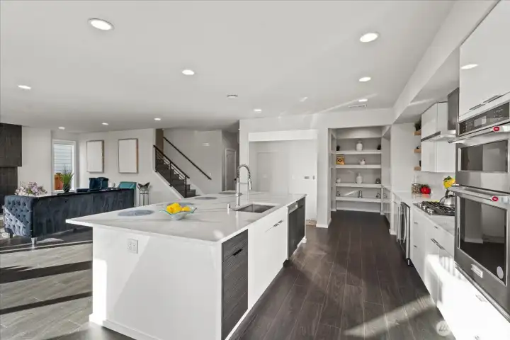 Kitchen with view of living room and butler's pantry
