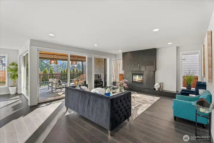 Grand room with fireplace, facing the outdoor patio