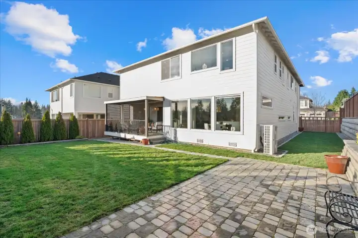 Gorgeous and spacious back yard with stone BBQ/entertainment area