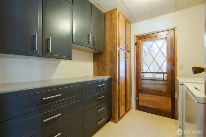 Abundant storage in the laundry room.