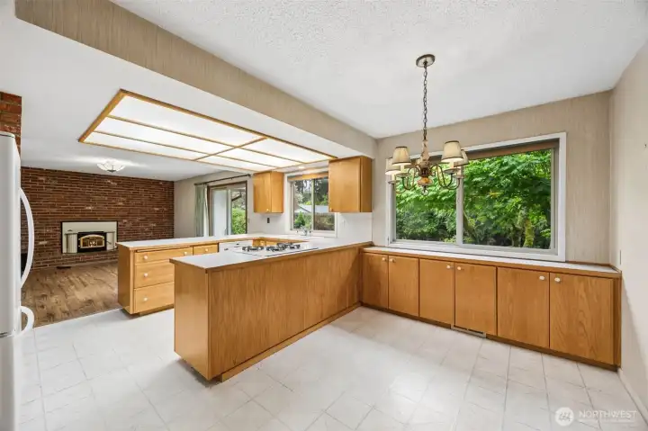Eating space in the kitchen too! Or this could make a great homework spot... what would you use it for? View of the second living space beyond the kitchen shown here as well.