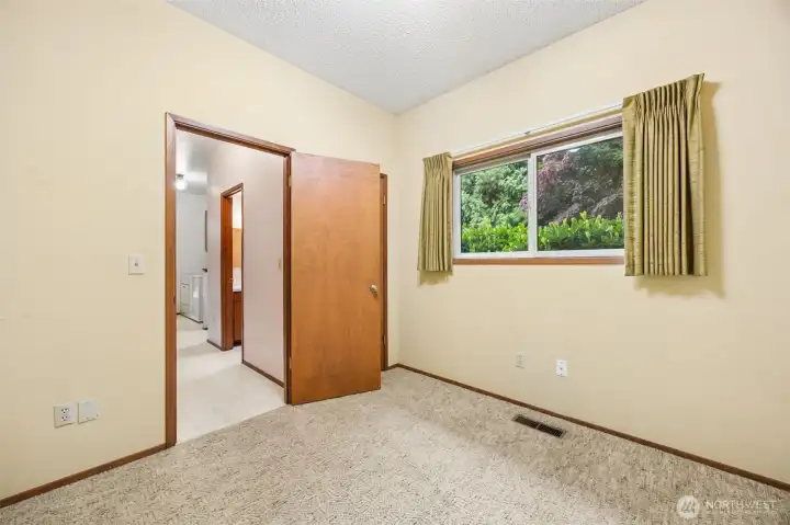 4th bedroom at the end of the hall. This room is on the opposite side of the house from the other 3 bedrooms.