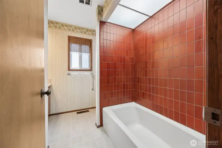 Full bath at the end of the hall. Bathtub/shower combo in here.