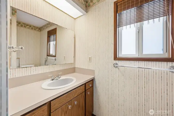 Sink area in the full bathroom.