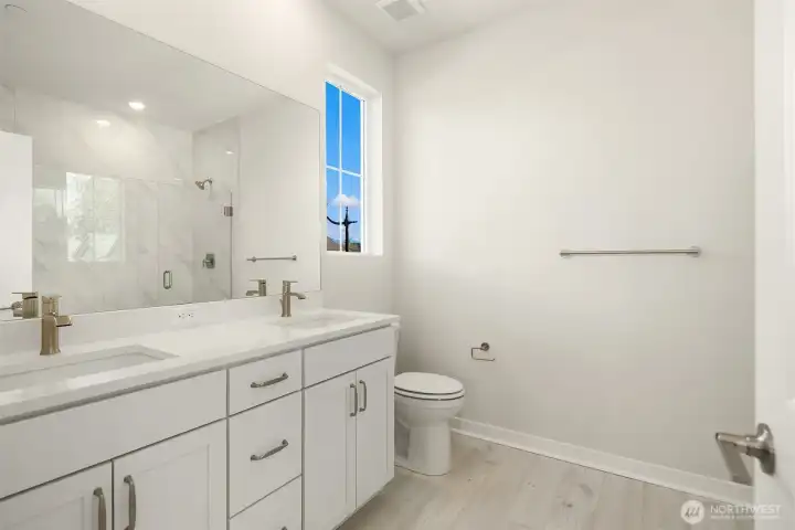 Primary bathroom. Similar home shown.