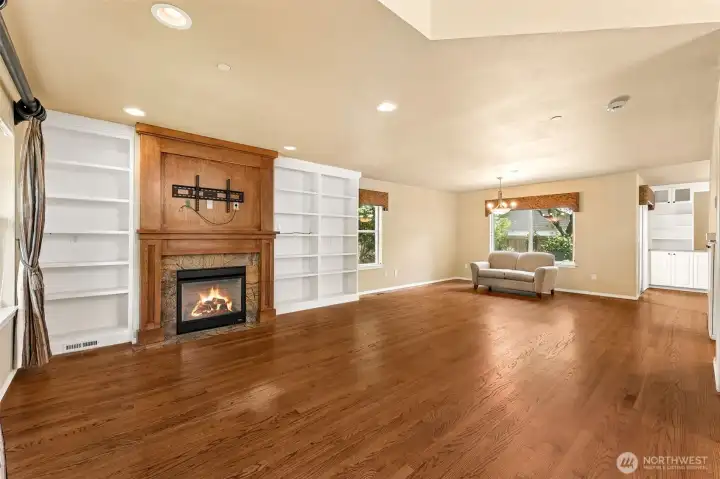 Hardwood floors and a cozy gas fireplace welcome you to this spacious home.