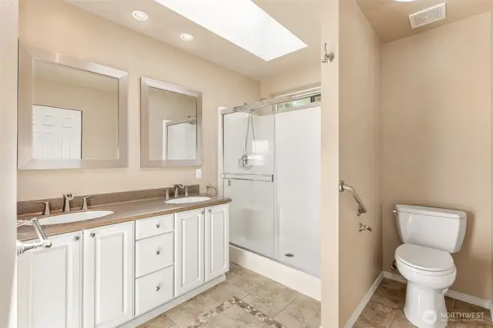 Primary bathroom suite.